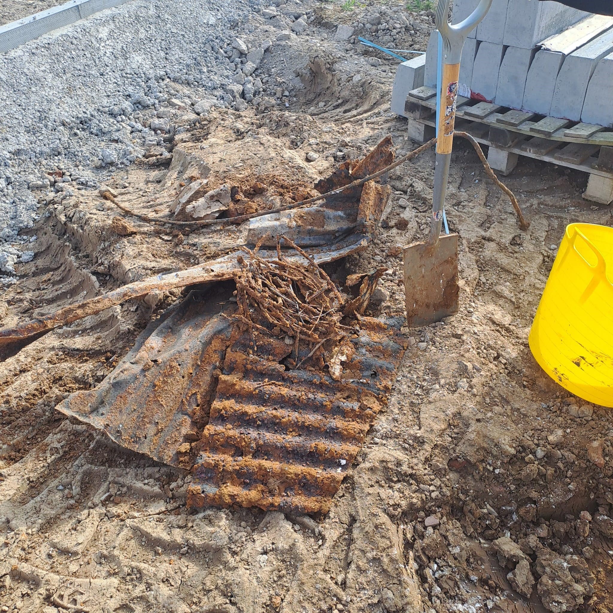 Corrugated iron sheets, metal bars and supports discovered in Kent