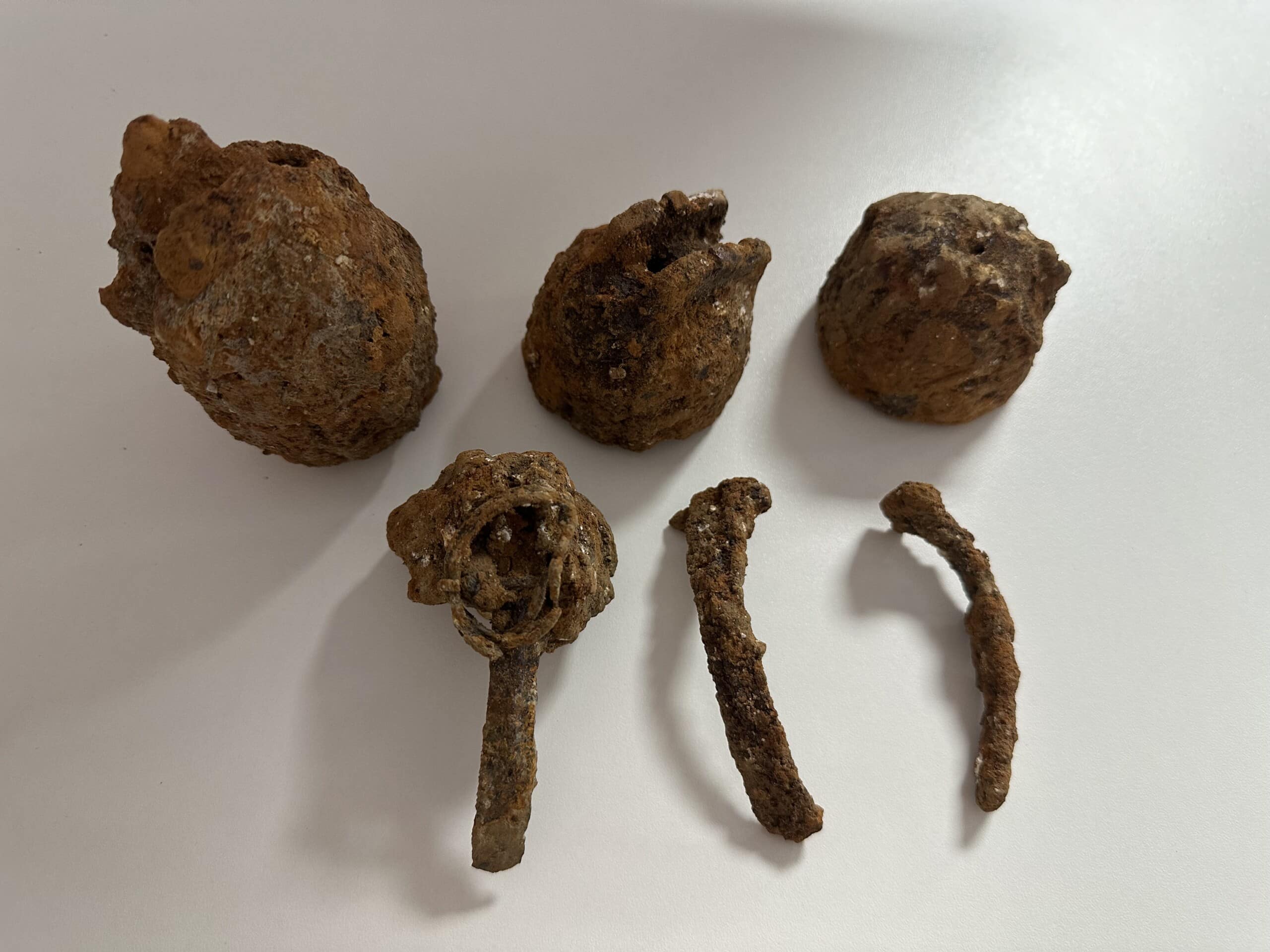 Parts of inert No. 36 Mills Grenades recovered during UXO Target Investigation in Kent