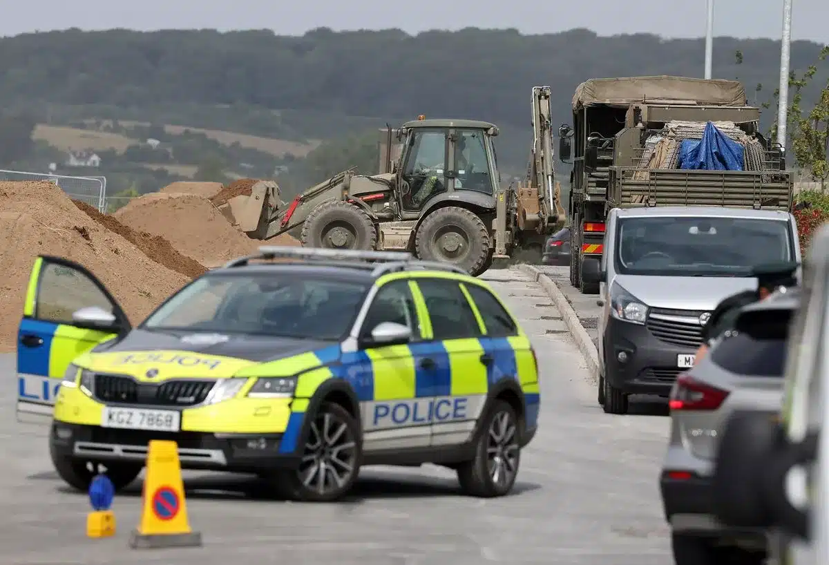 Army and police manage a suspected 500kg WWII unexploded bomb discovered at the Rivenwood housing development in Newtownards.