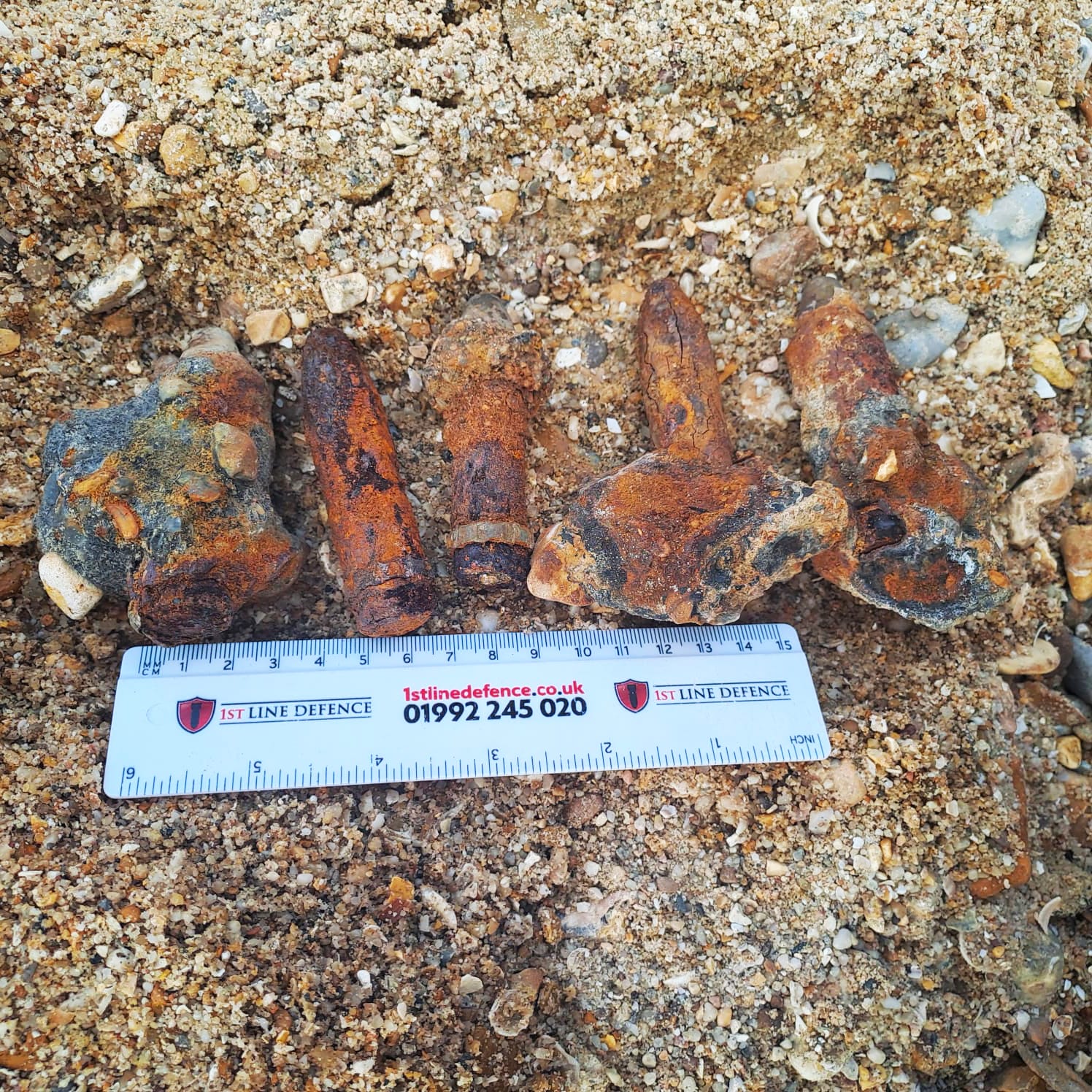 20mm Cannon rounds (with rulers for scale) which were discovered on a development site in Southampton by 1st Line Defence.